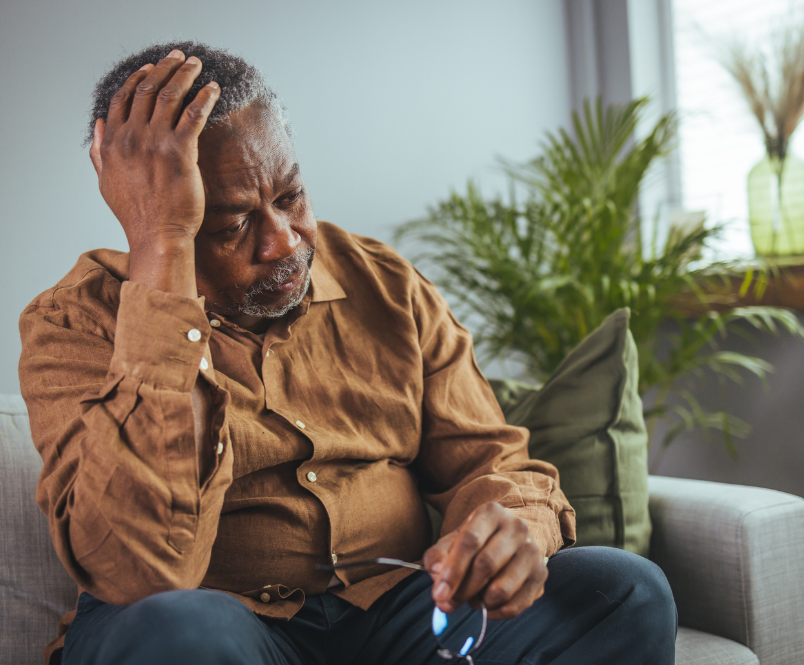 Older man experiencing Migraine pain